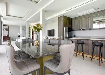 Modern kitchen and dining area with contemporary furnishings