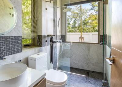 Modern bathroom with large window and shower