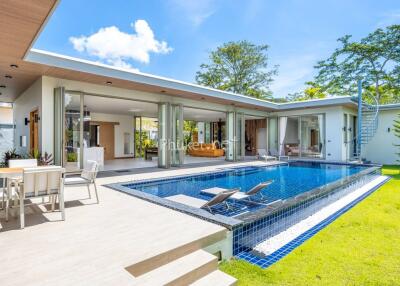 Modern outdoor area with swimming pool and patio