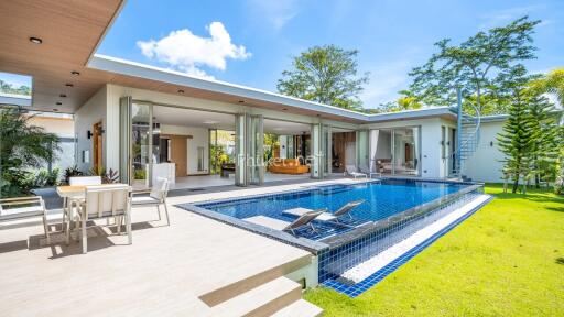 Modern outdoor area with swimming pool and patio