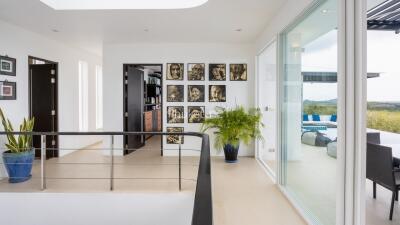 Modern living area with wall art and large windows