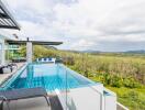 Modern building with an outdoor pool and scenic view