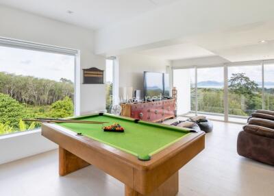 Spacious living area with pool table and panoramic view