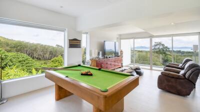 Spacious living area with pool table and panoramic view