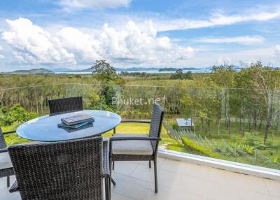 Balcony with outdoor seating and scenic views