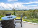 Balcony with outdoor seating and scenic views