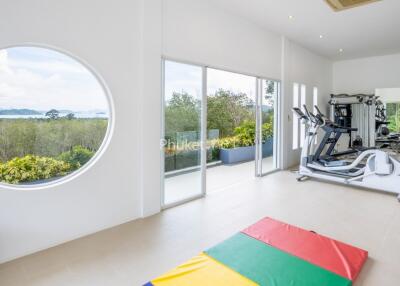 Home gym with fitness equipment and scenic view