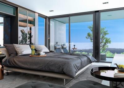 Modern bedroom with glass walls and a scenic view