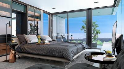 Modern bedroom with glass walls and a scenic view
