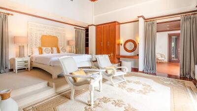 Spacious and elegant bedroom with luxurious furnishings