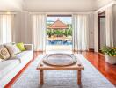 Spacious living room with pool view