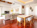 Modern living room with dining area and hardwood floors