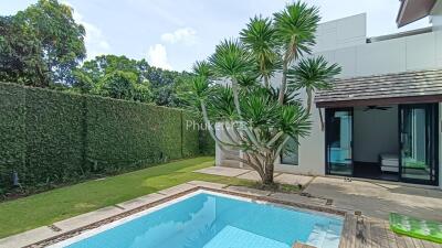 Outdoor area with pool and garden