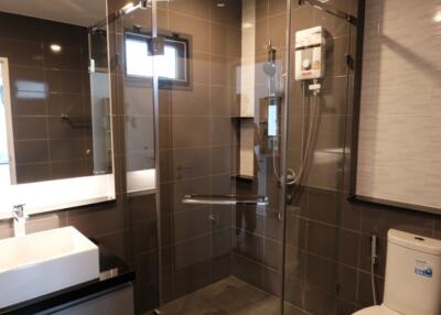 Modern bathroom with glass shower enclosure