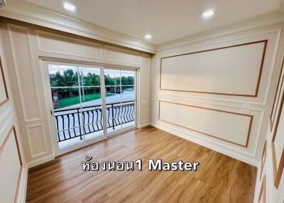 bedroom with balcony view