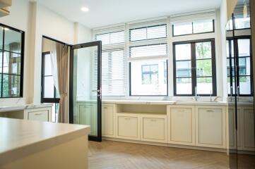 Bright and modern kitchen with large windows