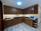 Well-furnished kitchen with modern appliances