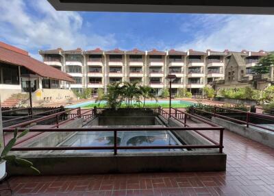 Exterior view of residential building with pool