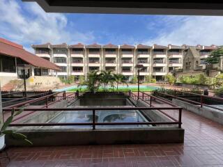 Exterior view of residential building with pool