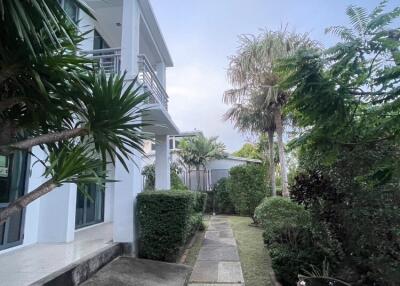 Front yard with walkway and garden