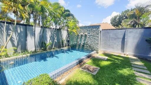 Private swimming pool with landscaped garden