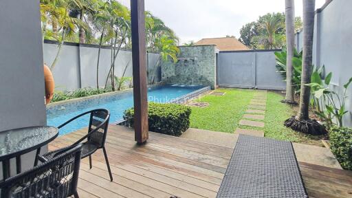 Outdoor area with swimming pool and patio