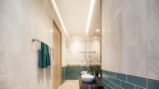 Modern bathroom with dual sinks and elegant tile design