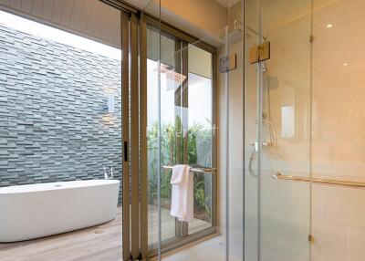 Modern bathroom with outdoor tub view