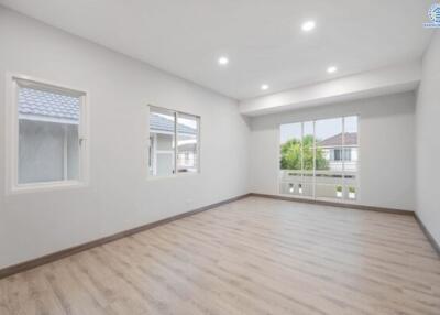 Spacious and bright living room with large windows