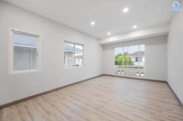 Spacious and bright living room with large windows