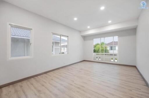 Spacious and bright living room with large windows