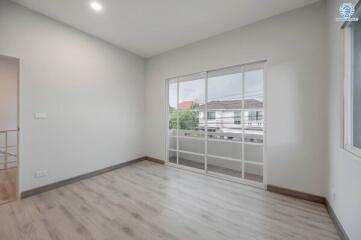 Spacious living room with large windows