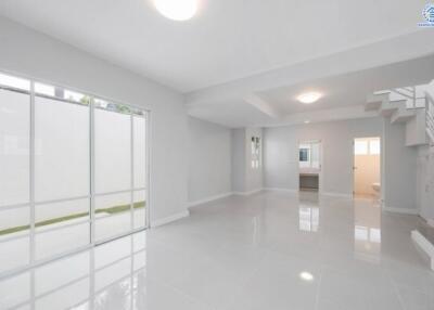 modern empty living room with large windows