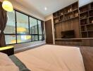 Modern bedroom with large window and built-in shelving