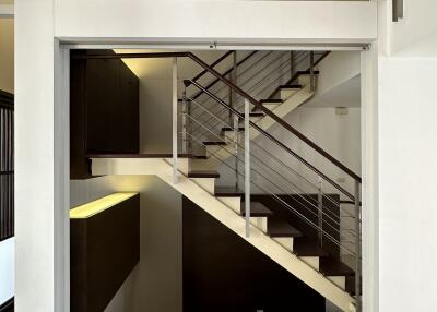 Modern staircase with railings in a residential building