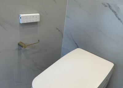 Modern bathroom with smart toilet