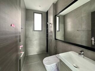 Modern bathroom with large mirror