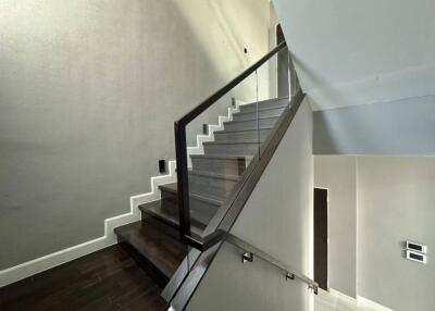 Modern staircase with glass railings