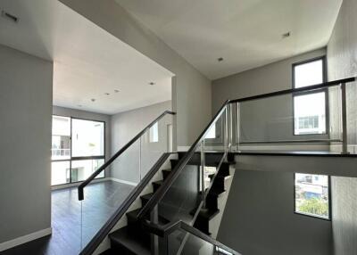 modern interior stairway with large windows