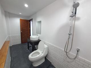 Modern bathroom with shower and toilet