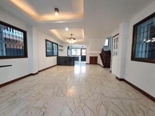 Spacious and well-lit main living area with modern fixtures