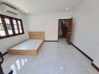 Spacious unfurnished bedroom with natural light