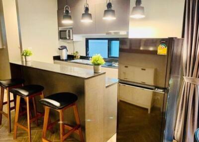 Modern kitchen with breakfast bar and appliances