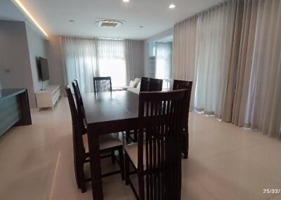 Spacious living and dining area with modern furnishings
