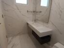 Modern bathroom with marble tiles