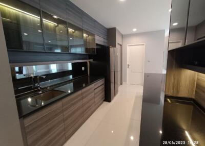Modern kitchen with sleek cabinets and countertops