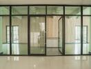 Glass partitioned office space with reflections