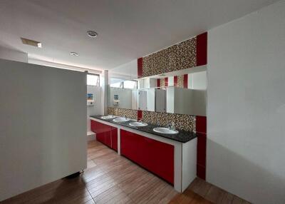 Modern bathroom with multiple sinks and large mirrors