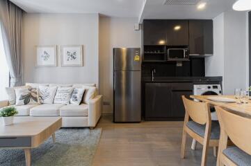 Modern living room with integrated kitchen