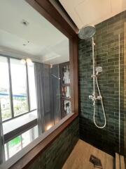 Bathroom with glass window and modern shower